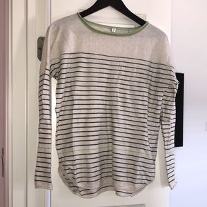 Black and white striped sweater.